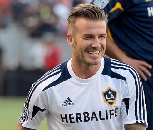 Елтън Джон иска Бекъм да учи сина му на футбол